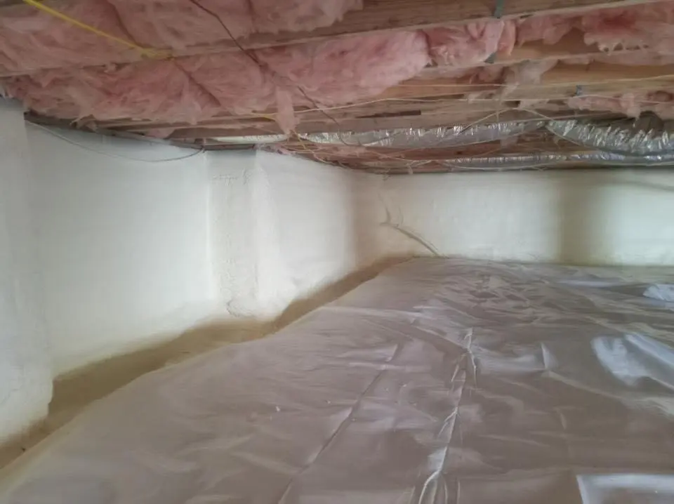 Crawl space encapsulation with closed-cell spray foam for Commercial Roof Restoration in Milton